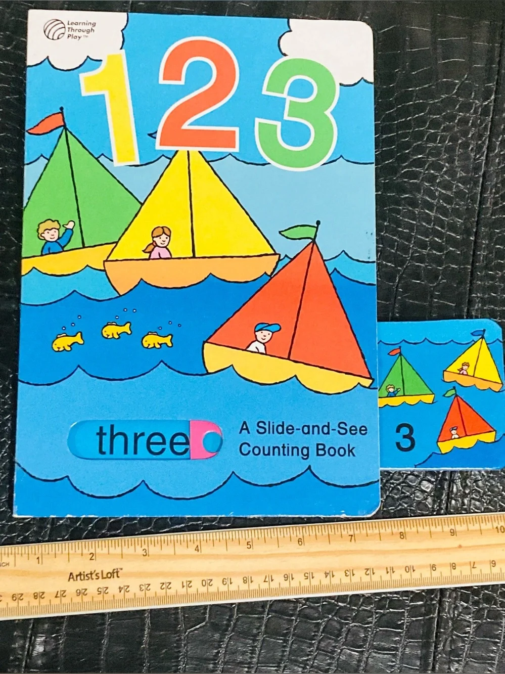 1-2-3 A Slide-and-See Counting Book by Learning Through Play